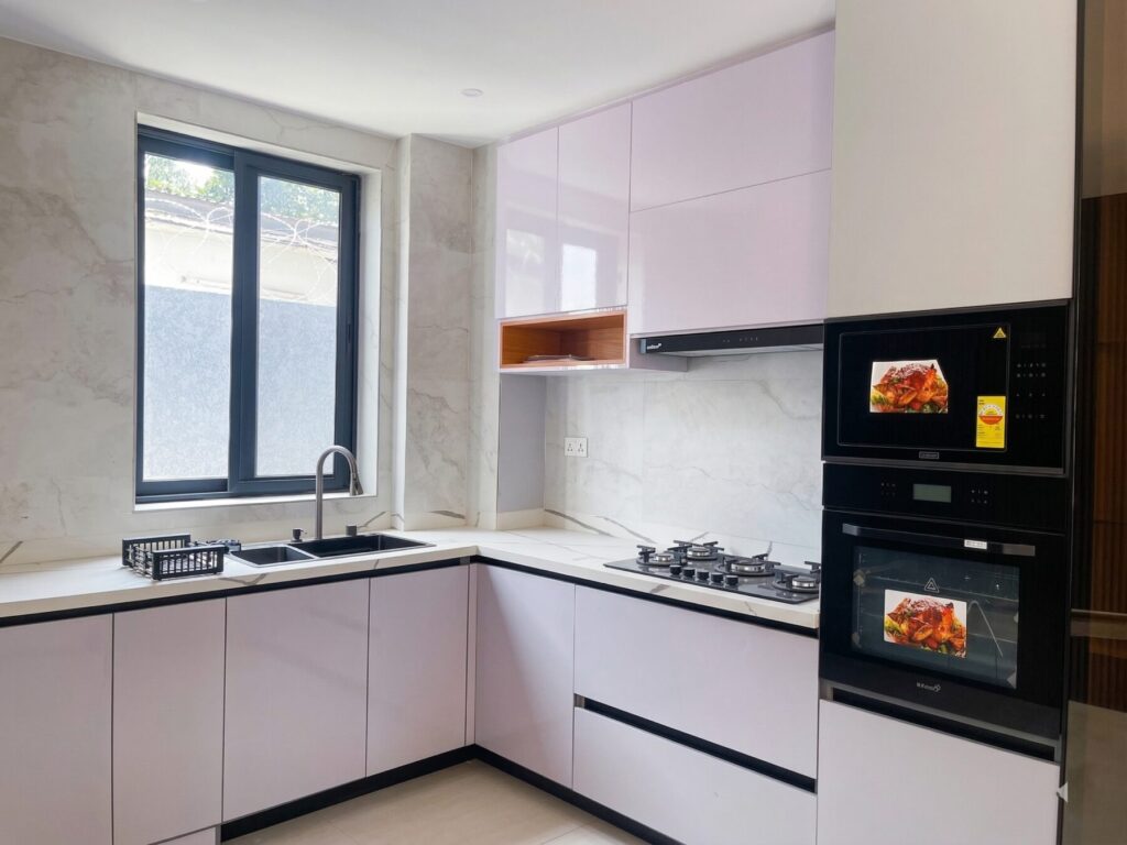 Modern kitchen finishing by Grace Home Construction